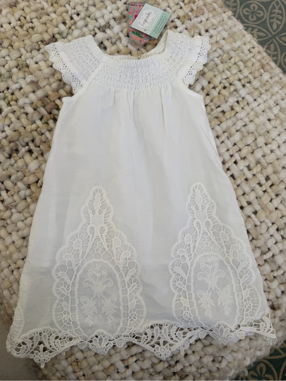 Cupcake French tablecloth child’s christening dress.